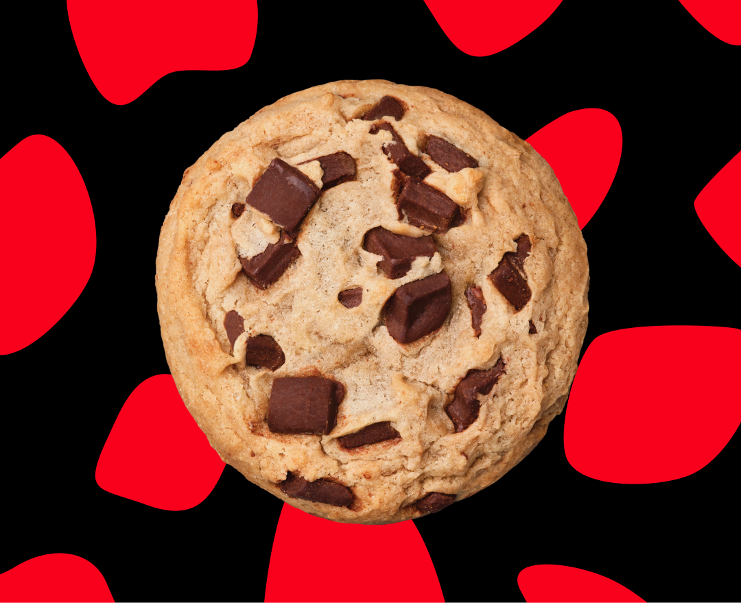 Vachon Signature Chocolate Chip Cookie with black background and red spots