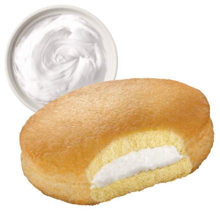Full Moon cake with a bowl of vanilla flavour cream